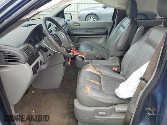 2004 Mercury Monterey Convenience z VIN 2MRDA20204BJ11242, wystawiony jako Copart lot #71081394 z przebiegiem 128 672 mil mil oraz Szkoda całkowita • Salvage title. Historia ofert i sprzedaży dostępna na DreamBid. Obrazek 7.