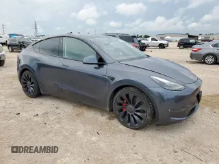 2022 Tesla Model Y Performance with VIN 7SAYGDEF1NF535286, listed as a Copart auction lot 62082545 with 16,387 mi miles and Salvage title. Bid and sale history available at DreamBid. Image 4.