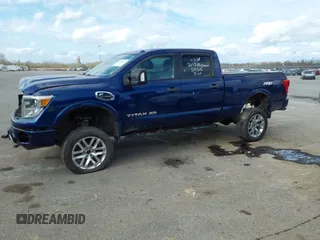 2017 Nissan Titan Pro-4X z VIN 1N6BA1F45HN519305, wystawiony jako IAAI lot #41689197 z przebiegiem 116 562 mil mil oraz . Historia ofert i sprzedaży dostępna na DreamBid. Obrazek 14.