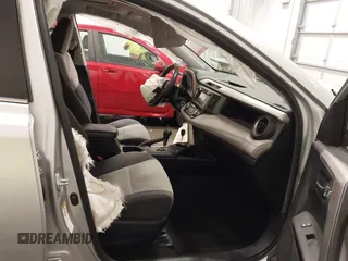 2014 Toyota RAV4 XLE with VIN JTMRFREV5ED052819, listed as a IAAI auction lot 42014672 with 235,481 mi miles and . Bid and sale history available at DreamBid. Image 5.