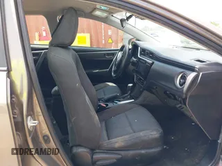 2018 Toyota Corolla L z VIN 5YFBURHE1JP855556, wystawiony jako IAAI lot #42273685 z przebiegiem 165 792 mil mil oraz . Historia ofert i sprzedaży dostępna na DreamBid. Obrazek 5.