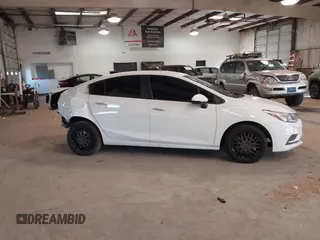 2018 Chevrolet Cruze LS with VIN 1G1BC5SM0J7171166, listed as a IAAI auction lot 41758405 with 137,297 mi miles and . Bid and sale history available at DreamBid. Image 14.