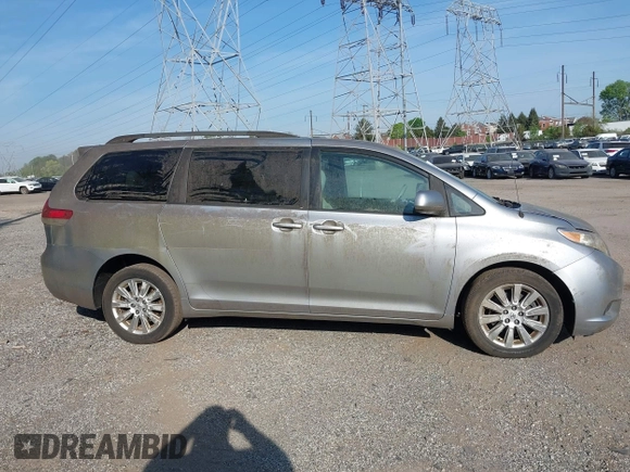 2011 Toyota Sienna LE with VIN 5TDJK3DC9BS012944, listed as a IAAI auction lot 42106998 with 108,700 mi miles. Bid and sale history available at carsss.com. Image 14.