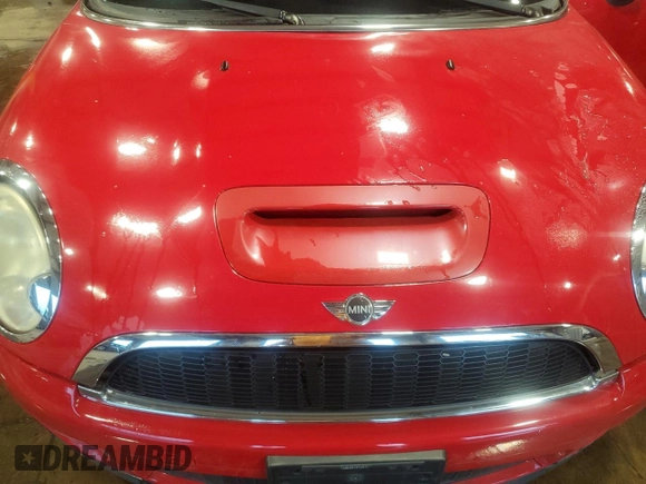 2010 MINI Convertible S with VIN WMWMS3C50ATY51636, listed as a Copart auction lot 66097715 with 103,525 mi miles and Salvage title. Bid and sale history available at DreamBid. Image 11.