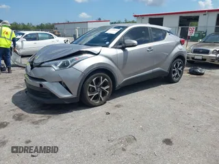 2019 Toyota C-HR XLE with VIN NMTKHMBX8KR093044, listed as a IAAI auction lot 41939036 with 60,130 mi miles. Bid and sale history available at carsss.com. Image 17.