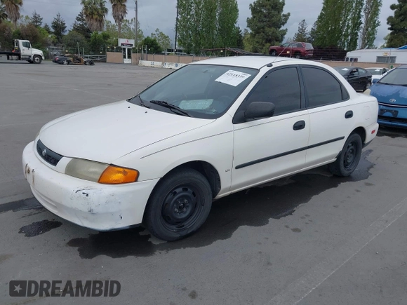 1997 Mazda Protege DX with VIN JM1BC1417V0156858, listed as a IAAI auction lot 42118339 with 187,673 mi miles and . Bid and sale history available at DreamBid. Image 2.
