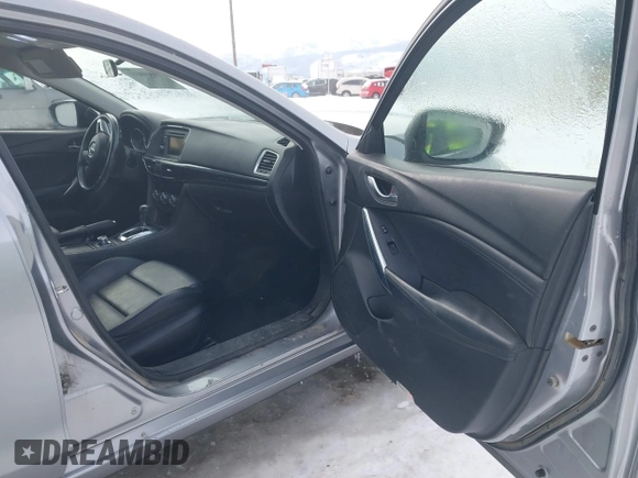 2014 Mazda Mazda6 i Touring with VIN JM1GJ1V62E1134427, listed as a IAAI auction lot 41550411 with 112,804 mi miles. Bid and sale history available at carsss.com. Image 5.