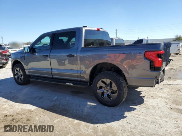 2024 Ford F-150 Lightning XLT with VIN 1FTVW3LK0RWG24006, listed as a Copart auction lot 47560225 with 6,645 mi miles and Salvage title. Bid and sale history available at DreamBid. Image 2.
