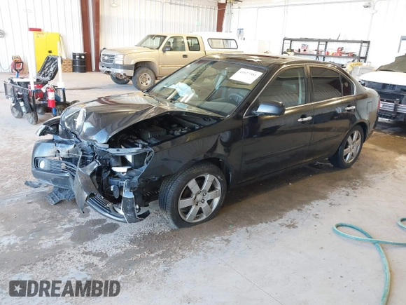 2007 Kia Optima EX with VIN KNAGE124875134352, listed as a IAAI auction lot 41627381 with 183,053 mi miles. Bid and sale history available at carsss.com. Image 2.
