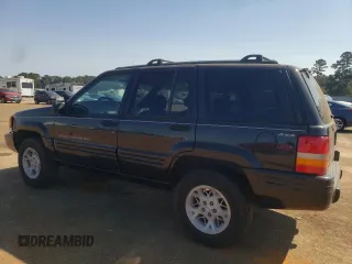 1998 Jeep Grand Cherokee Limited with VIN 1J4GZ78Y5WC170797, listed as a Copart auction lot 75227664 with 177,781 mi miles and Salvage Title. Bid and sale history available at carsss.com. Image 2.