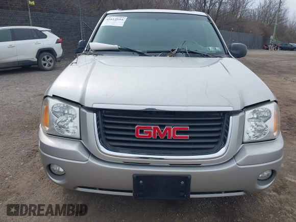2004 GMC Envoy SLE with VIN 1GKDT13S142219365, listed as a IAAI auction lot 41612594 with 72,292 mi miles. Bid and sale history available at carsss.com. Image 6.