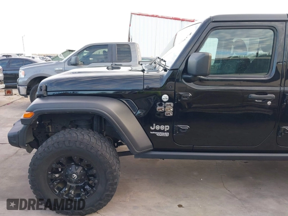 2019 Jeep Wrangler Unlimited Sport S with VIN 1C4HJXDN6KW686480, listed as a IAAI auction lot 41300842 with 67,359 mi miles and . Bid and sale history available at DreamBid. Image 17.