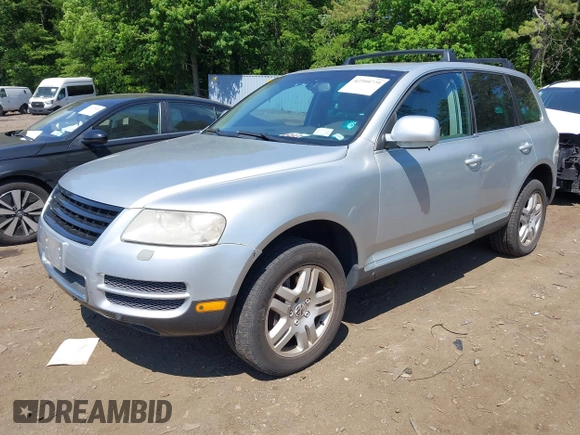 2005 Volkswagen Touareg 4.2L V8 z VIN WVGZM77L15D080697, wystawiony jako IAAI lot #42399779 z przebiegiem 138 040 mil mil oraz . Historia ofert i sprzedaży dostępna na DreamBid. Obrazek 2.