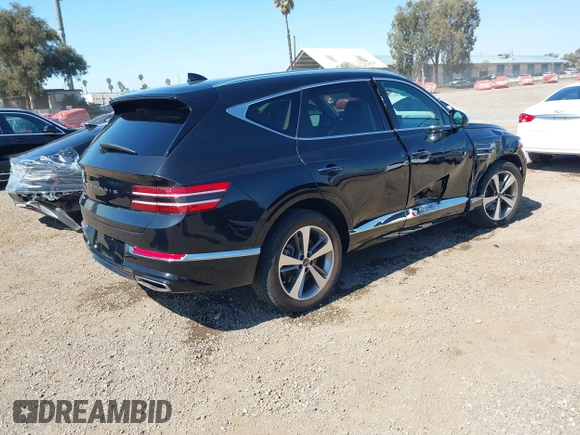 2021 Genesis GV80 with VIN KMUHB4SB7MU034287, listed as a IAAI auction lot 41663039 with 65,405 mi miles and . Bid and sale history available at DreamBid. Image 4.