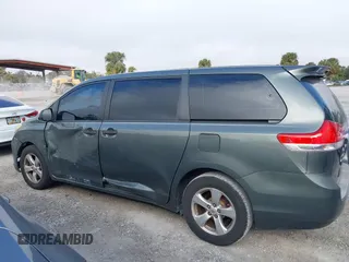 2014 Toyota Sienna L with VIN 5TDZK3DC6ES421278, listed as a IAAI auction lot 41178679 with 202,823 mi miles. Bid and sale history available at carsss.com. Image 14.
