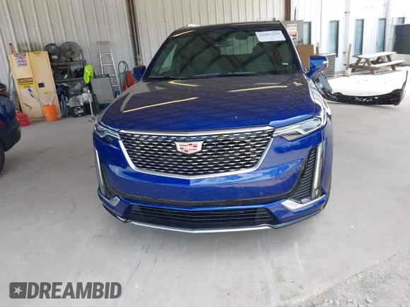 2025 Cadillac XT6 FWD Premium Luxury with VIN 1GYKPCRS5SZ119357, listed as a IAAI auction lot 42087218 with 11,352 mi miles. Bid and sale history available at carsss.com. Image 13.