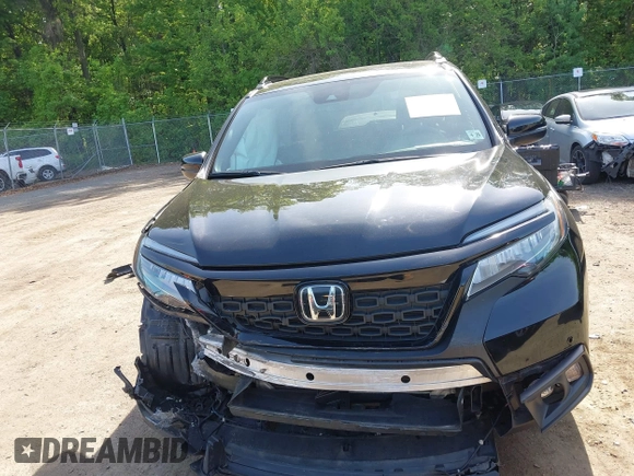 2021 Honda Passport Touring z VIN 5FNYF8H96MB014947, wystawiony jako IAAI lot #42150399 z przebiegiem 47 499 mil mil oraz . Historia ofert i sprzedaży dostępna na DreamBid. Obrazek 12.