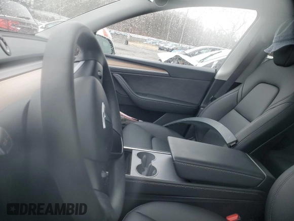 2023 Tesla Model Y Long Range with VIN 7SAYGDEEXPA122953, listed as a Copart auction lot 52627095 with Not Provided miles and Salvage Title. Bid and sale history available at DreamBid. Image 9.