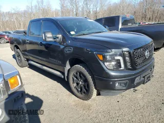 2018 Nissan Titan XD Platinum Reserve with VIN 1N6BA1F4XJN516387, listed as a Copart auction lot 88000895 with 77,492 mi miles and Clean Title. Bid and sale history available at carsss.com. Image 4.