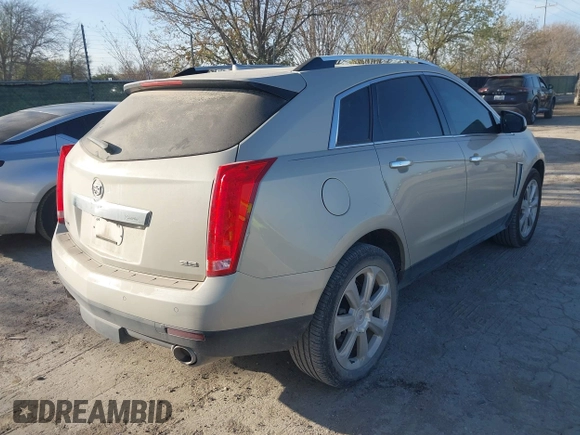 2014 Cadillac SRX Premium Collection with VIN 3GYFNDE37ES574109, listed as a IAAI auction lot 41770404 with 66,478 mi miles and . Bid and sale history available at DreamBid. Image 4.