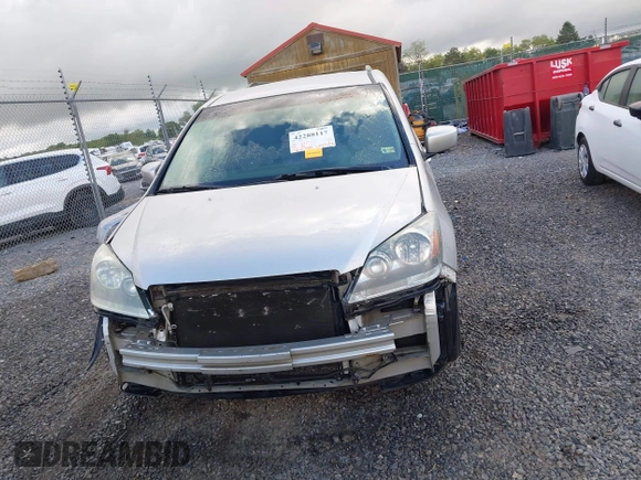2006 Honda Odyssey EX z VIN 5FNRL38406B403736, wystawiony jako IAAI lot #42288117 z przebiegiem 159 686 mil mil oraz . Historia ofert i sprzedaży dostępna na DreamBid. Obrazek 13.