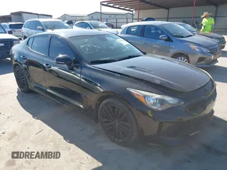 2018 Kia Stinger with VIN KNAE15LA5J6031079, listed as a IAAI auction lot 41137507 with 82,911 mi miles and . Bid and sale history available at DreamBid. Image 1.