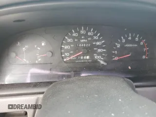 1997 Nissan Frontier XE z VIN 1N6SD11S2VC396213, wystawiony jako Copart lot #58315025 z przebiegiem 144 622 mil mil oraz Szkoda całkowita • Salvage title. Historia ofert i sprzedaży dostępna na DreamBid. Obrazek 9.