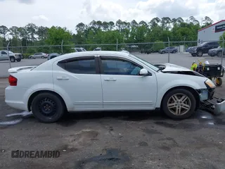 2012 Dodge Avenger SXT with VIN 1C3CDZCB5CN156288, listed as a IAAI auction lot 42115638 with 157,534 mi miles and . Bid and sale history available at DreamBid. Image 13.