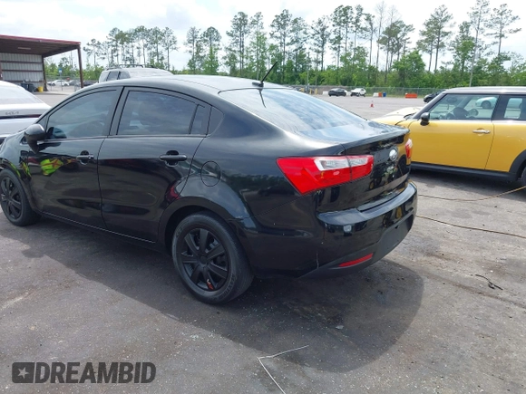 2014 Kia Rio LX with VIN KNADM4A33E6335499, listed as a IAAI auction lot 42123085 with 148,146 mi miles and . Bid and sale history available at DreamBid. Image 3.