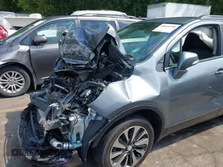 2019 Buick Encore Essence with VIN KL4CJGSM1KB890660, listed as a IAAI auction lot 40010798 with Not Provided miles and . Bid and sale history available at carsss.com. Image 6.