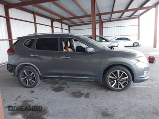 2018 Nissan Rogue SV with VIN JN8AT2MT9JW485804, listed as a IAAI auction lot 41711723 with 74,860 mi miles and . Bid and sale history available at carsss.com. Image 14.