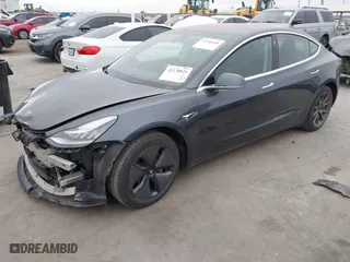 2018 Tesla Model 3 Long Range Battery with VIN 5YJ3E1EA8JF026497, listed as a IAAI auction lot 41360268 with 71,873 mi miles. Bid and sale history available at carsss.com. Image 19.