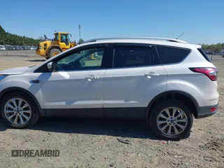2017 Ford Escape Titanium with VIN 1FMCU9J96HUE21191, listed as a IAAI auction lot 42006013 with 71,786 mi miles. Bid and sale history available at carsss.com. Image 14.