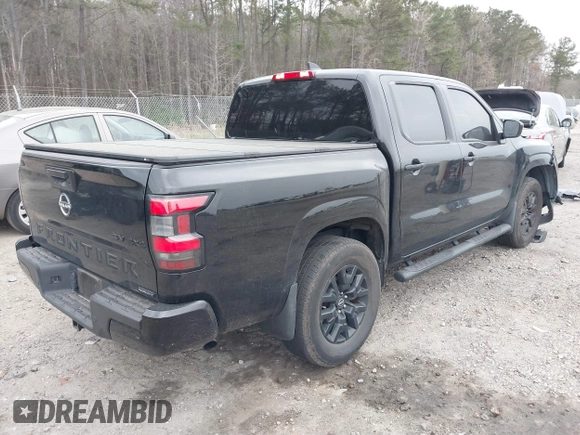 2023 Nissan Frontier PRO-4X with VIN 1N6ED1EK5PN658692, listed as a IAAI auction lot 41844237 with 50,358 mi miles. Bid and sale history available at carsss.com. Image 4.