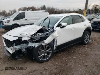 2024 Mazda CX-30 2.5 S Premium Package with VIN 3MVDMBDM3RM614029, listed as a Copart auction lot 81659794 with 562 mi miles and Salvage Title. Bid and sale history available at carsss.com. Image 1.
