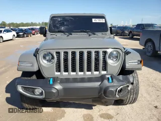 2023 Jeep Wrangler Sahara with VIN 1C4JJXP61PW505122, listed as a Copart auction lot 46719615 with 28,691 mi miles and Salvage Title. Bid and sale history available at DreamBid. Image 5.