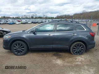 2015 Mazda CX-9 Grand Touring with VIN JM3TB3DV1F0465966, listed as a IAAI auction lot 42049749 with 74,470 mi miles and . Bid and sale history available at DreamBid. Image 14.