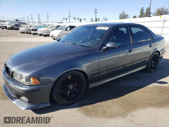 2000 BMW M5 z VIN WBSDE9349YBZ94615, wystawiony jako Copart lot #88802245 z przebiegiem 157 774 mil mil oraz Tytuł czysty. Historia ofert i sprzedaży dostępna na DreamBid. Obrazek 1.