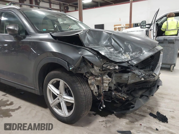 2020 Mazda CX-5 Grand Touring with VIN JM3KFBDM3L0739763, listed as a IAAI auction lot 41751250 with 88,063 mi miles and . Bid and sale history available at carsss.com. Image 6.