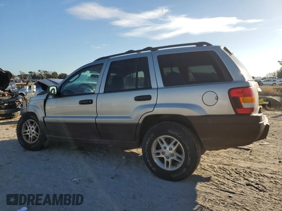 2003 Jeep Grand Cherokee Laredo z VIN 1J4GX48N63C509220, wystawiony jako Copart lot #72730964 z przebiegiem 95 216 mil mil oraz Szkoda całkowita • Salvage title. Historia ofert i sprzedaży dostępna na DreamBid. Obrazek 2.