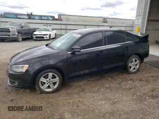 2012 Volkswagen Jetta TDI w/Premium & Nav with VIN 3VWLL7AJXCM393122, listed as a Copart auction lot 61974105 with 140,434 mi miles and Salvage title. Bid and sale history available at DreamBid. Image 1.