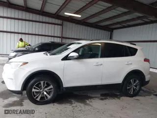 2018 Toyota RAV4 XLE with VIN JTMRFREV6JD222115, listed as a IAAI auction lot 41505367 with 118,126 mi miles. Bid and sale history available at carsss.com. Image 14.