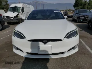 2019 Tesla Model S 100D with VIN 5YJSA1E44KF335113, listed as a Copart auction lot 82936844 with 89,770 mi miles and Salvage title. Bid and sale history available at DreamBid. Image 5.