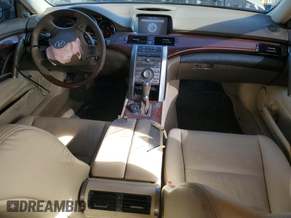 2009 Acura RL Tech Pkg with VIN JH4KB26609C002495, listed as a Copart auction lot 42647185 with 116,942 mi miles and Salvage Title. Bid and sale history available at carsss.com. Image 8.