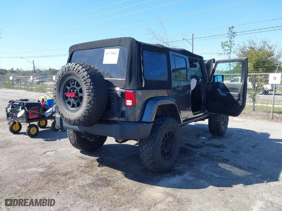 2018 Jeep Wrangler JK Unlimited Rubicon Recon with VIN 1C4HJWFG1JL840294, listed as a IAAI auction lot 41775967 with NaN miles. Bid and sale history available at carsss.com. Image 4.