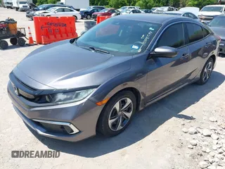 2019 Honda Civic Sedan LX with VIN 19XFC2F63KE025722, listed as a IAAI auction lot 42045594 with 57,290 mi miles. Bid and sale history available at carsss.com. Image 17.