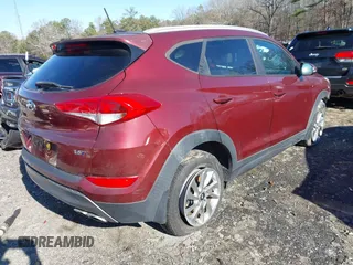 2016 Hyundai Tucson Sport with VIN KM8J33A22GU194476, listed as a IAAI auction lot 41201514 with 41,601 mi miles. Bid and sale history available at carsss.com. Image 4.
