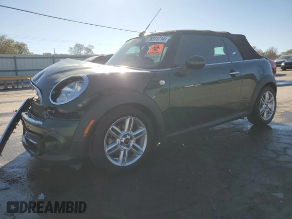 2015 MINI Convertible with VIN WMWZN3C53FT862148, listed as a Copart auction lot 76911714 with 56,065 mi miles and Salvage title. Bid and sale history available at DreamBid. Image 1.