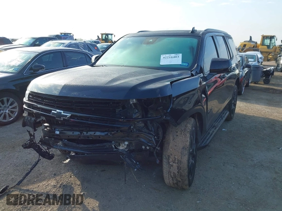 2024 Chevrolet Tahoe RST with VIN 1GNSCRKDXRR145972, listed as a IAAI auction lot 42216403 with 30,952 mi miles and . Bid and sale history available at DreamBid. Image 2.
