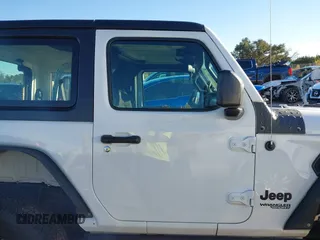 2021 Jeep Wrangler Sport S with VIN 1C4GJXAN2MW663880, listed as a IAAI auction lot 41059915 with 83,867 mi miles and . Bid and sale history available at DreamBid. Image 13.